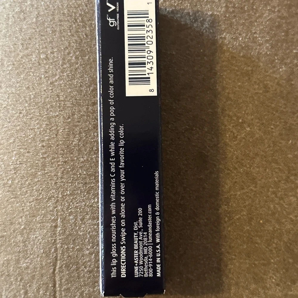 NIP Lune+Aster Vitamin C+E Lip Gloss.  Color Champion
